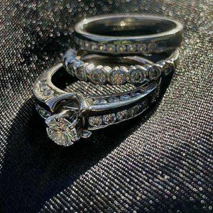 Engagement ring, wedding band and anniversary band